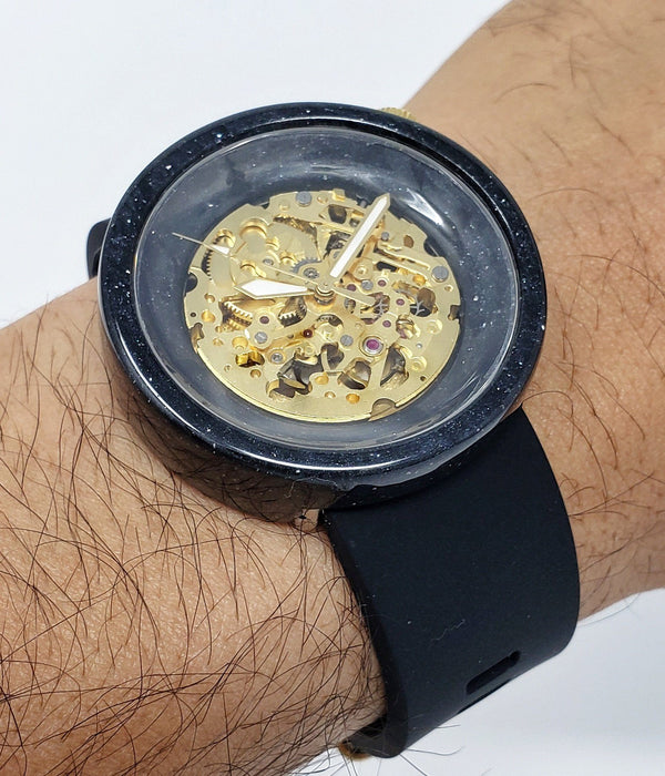 Black and gold automatic resin watch