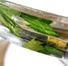 Close up of resin watch case with green leaf - Maker Watch Co.®